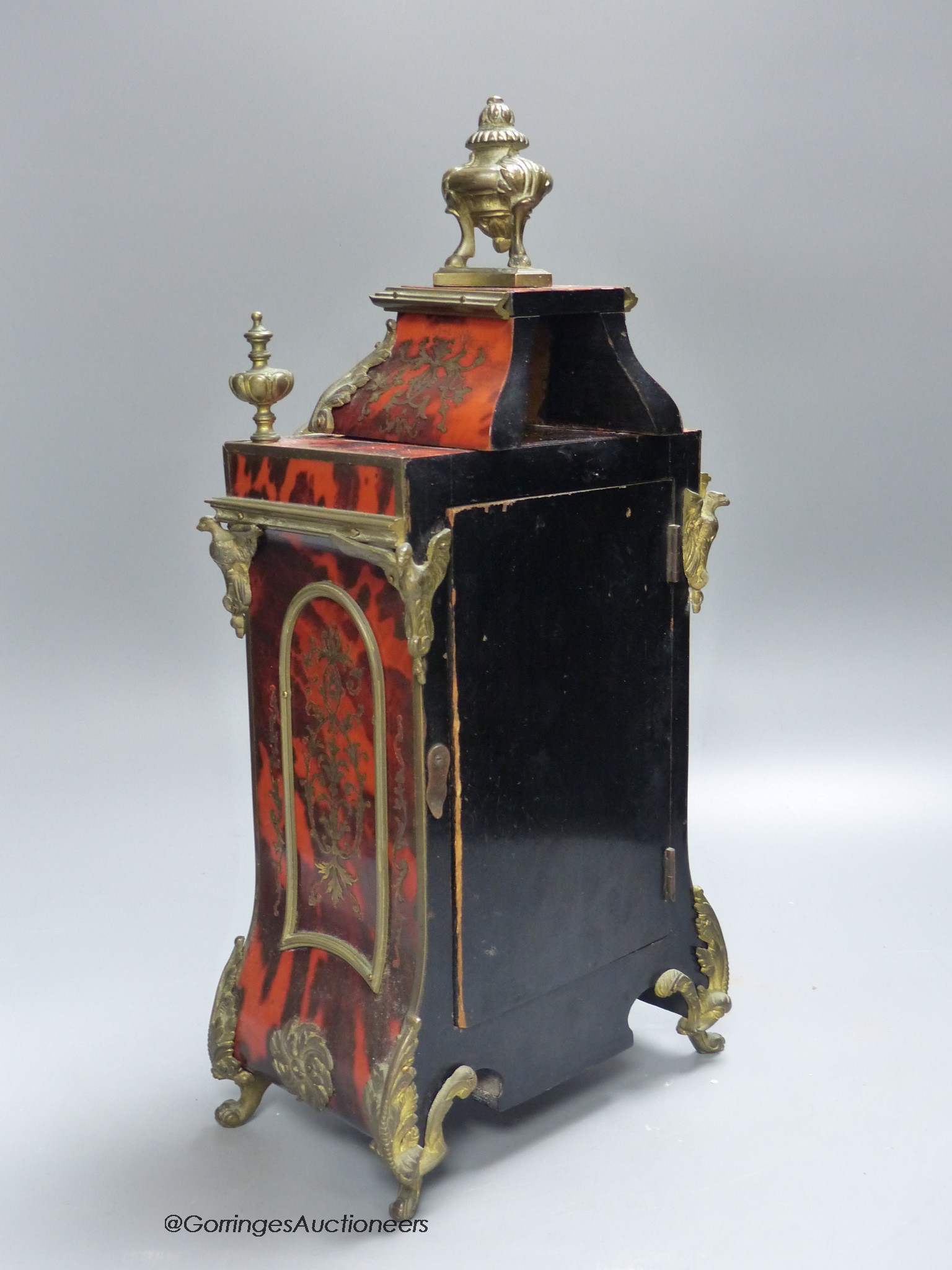 A 19th century French boulle work mantel clock, 37cm high